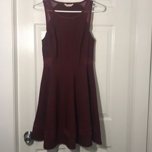 Burgundy fit and flare dress with mesh cut outs